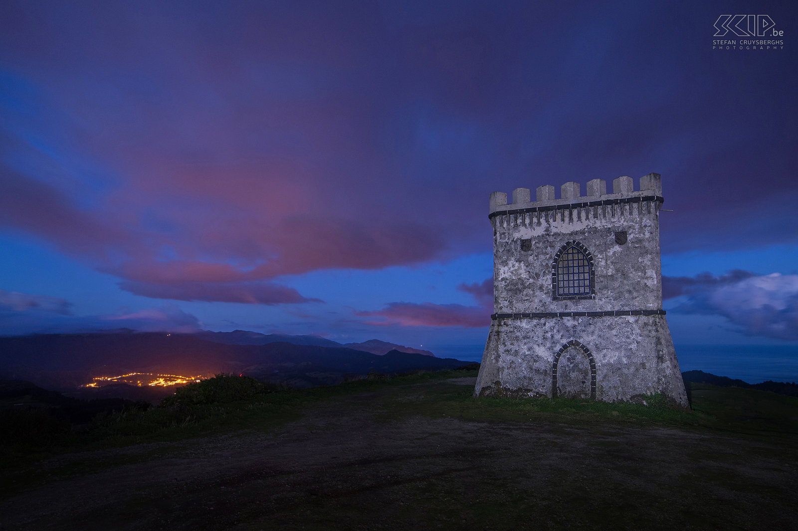 Castelo Branco and Furnas Night photo of the tower of Castelo Branco. From the hilltop you can see the lights of the village of Furnas. Stefan Cruysberghs